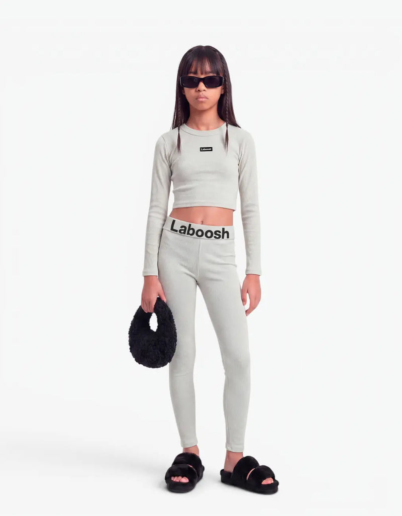 Grey ribbed long leggings for girls by Laboosh™, front view, full-length ribbed-knit leggings with Laboosh™ logo waistband, styled with a matching grey ribbed crop top on a white background