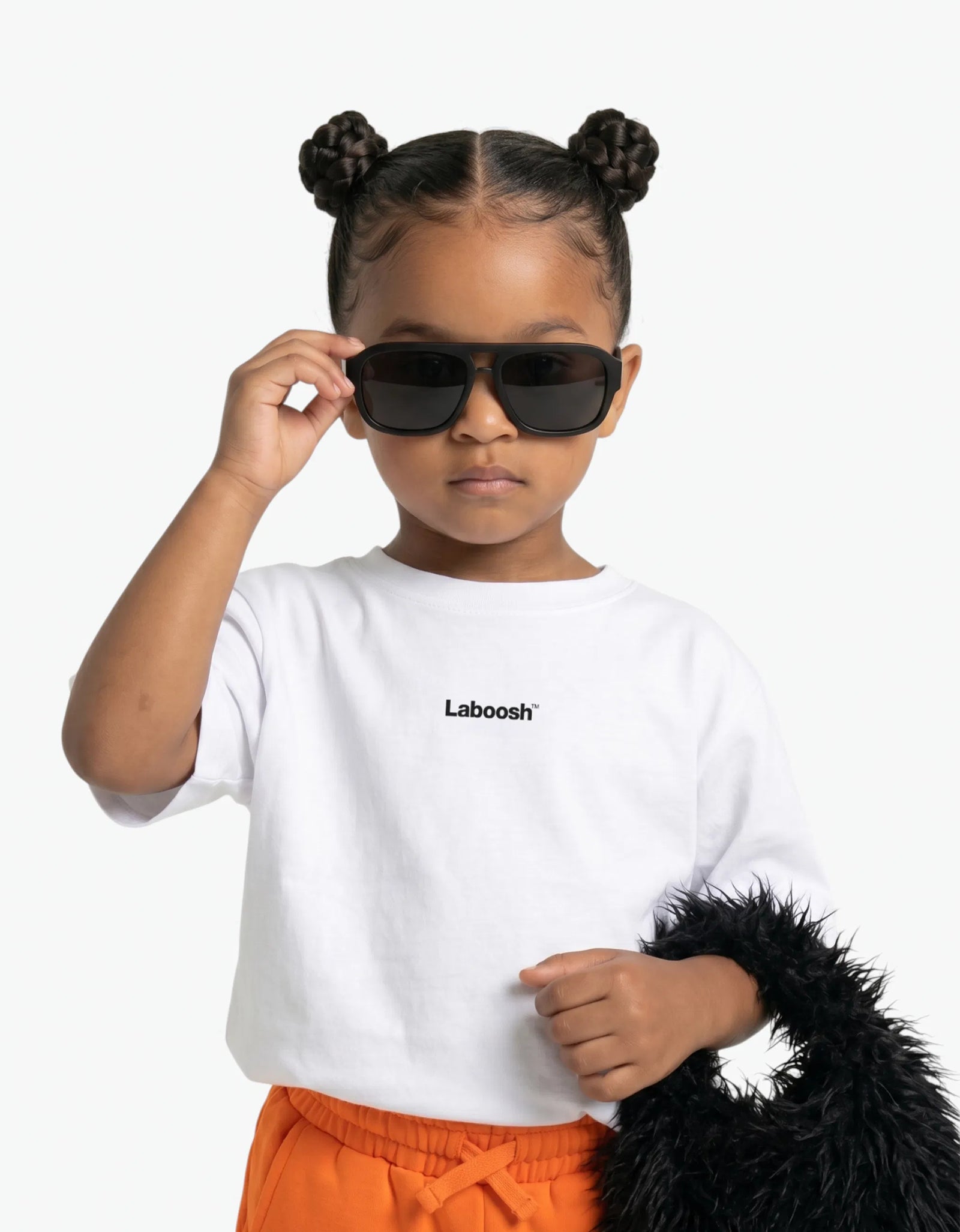 Orange Shorts for girls by Laboosh, styled view on a white background
