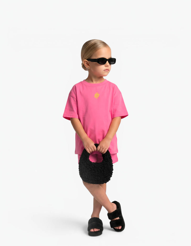 Pink Shorts for girls by Laboosh, front view on a white background