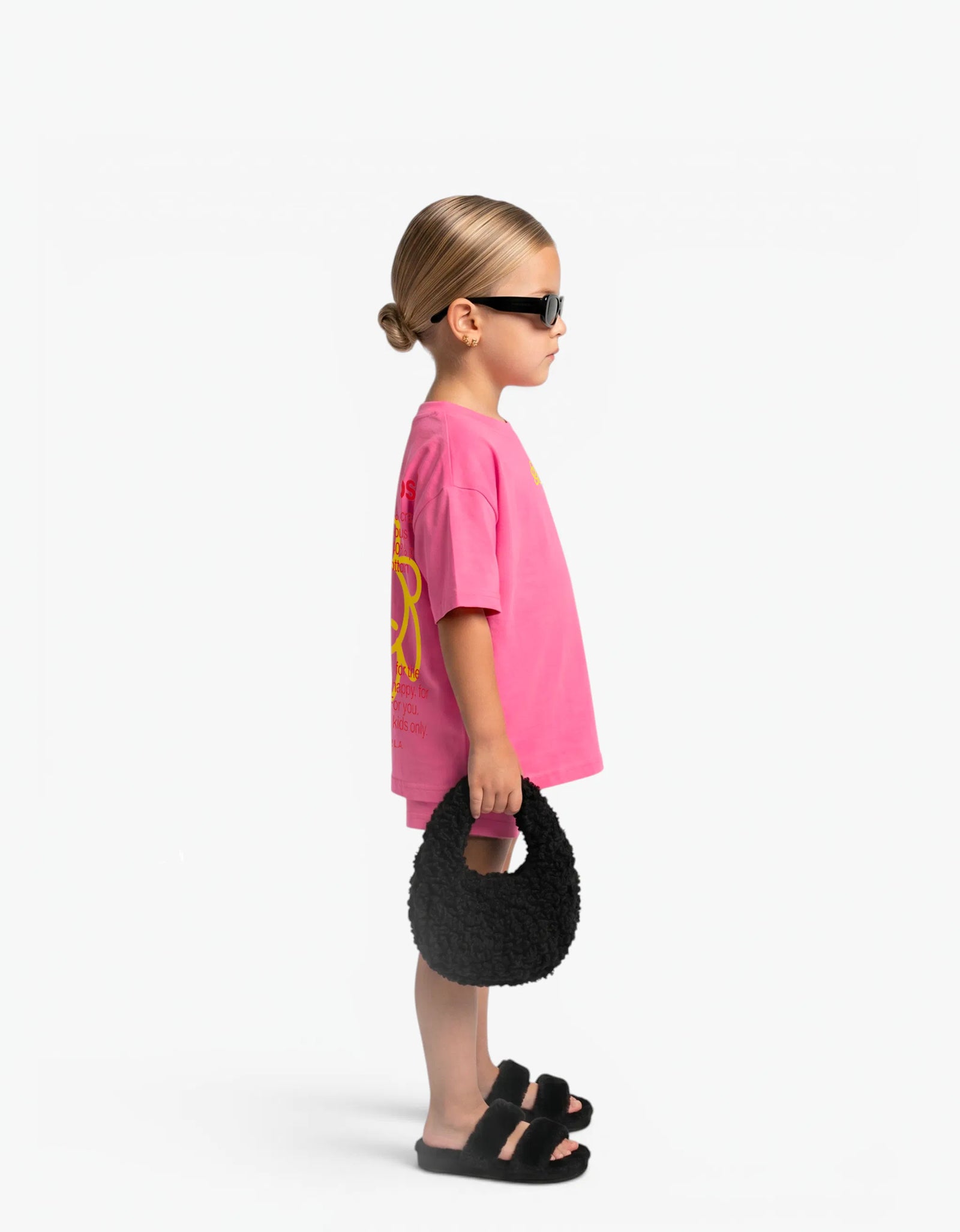 Pink Shorts for girls by Laboosh, side view on a white background