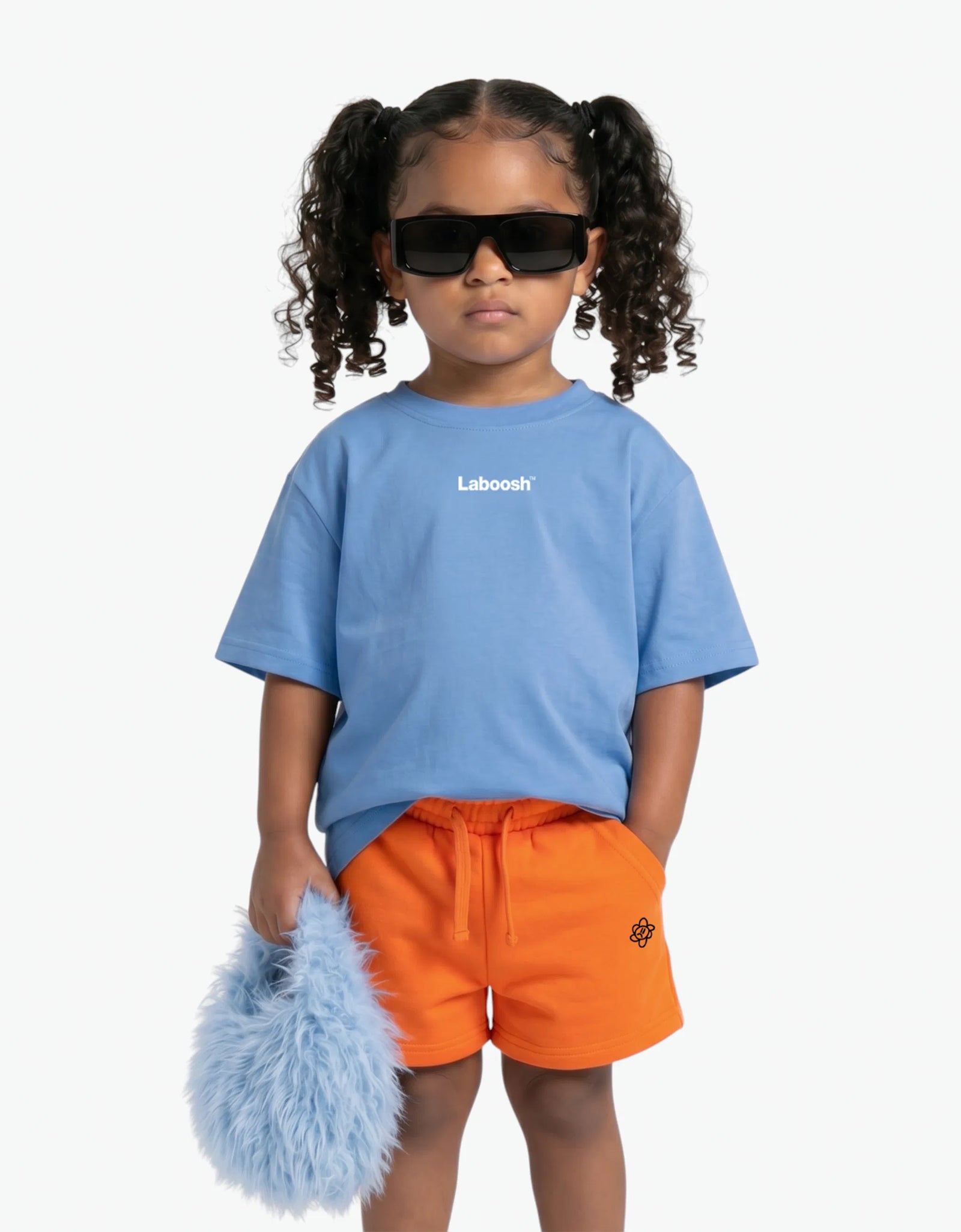 Orange Shorts for girls by Laboosh, styled view on a white background