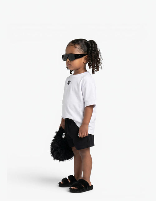 Black Shorts for girls by Laboosh, side view on a white background