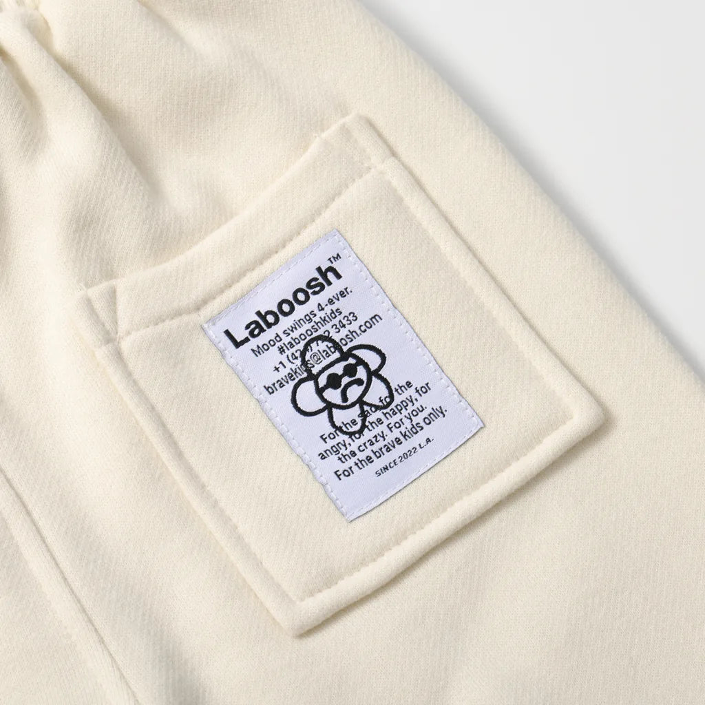 CLOUDSOFT® Cotton Joggers, Cream — label view | Laboosh™