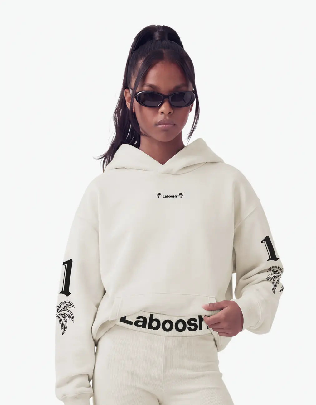 Oversized hoodie, half-body close-up — Laboosh™ branding on the chest, on a soft white studio background, made to move with active kids.