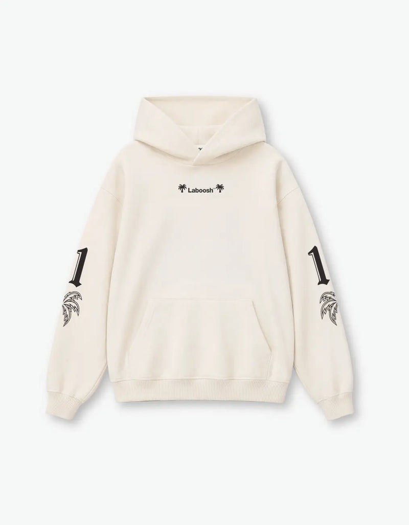 Girl modelling oversized hoodie, front view, Laboosh™ detail on the chest, on a white background.