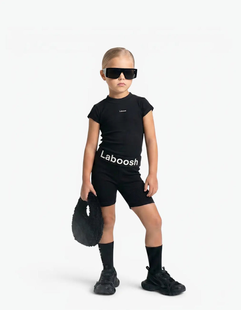 Black ribbed two-piece set, front view — Laboosh™ branding on the chest, on a white background, soft 100% cotton with a comfy stretch.