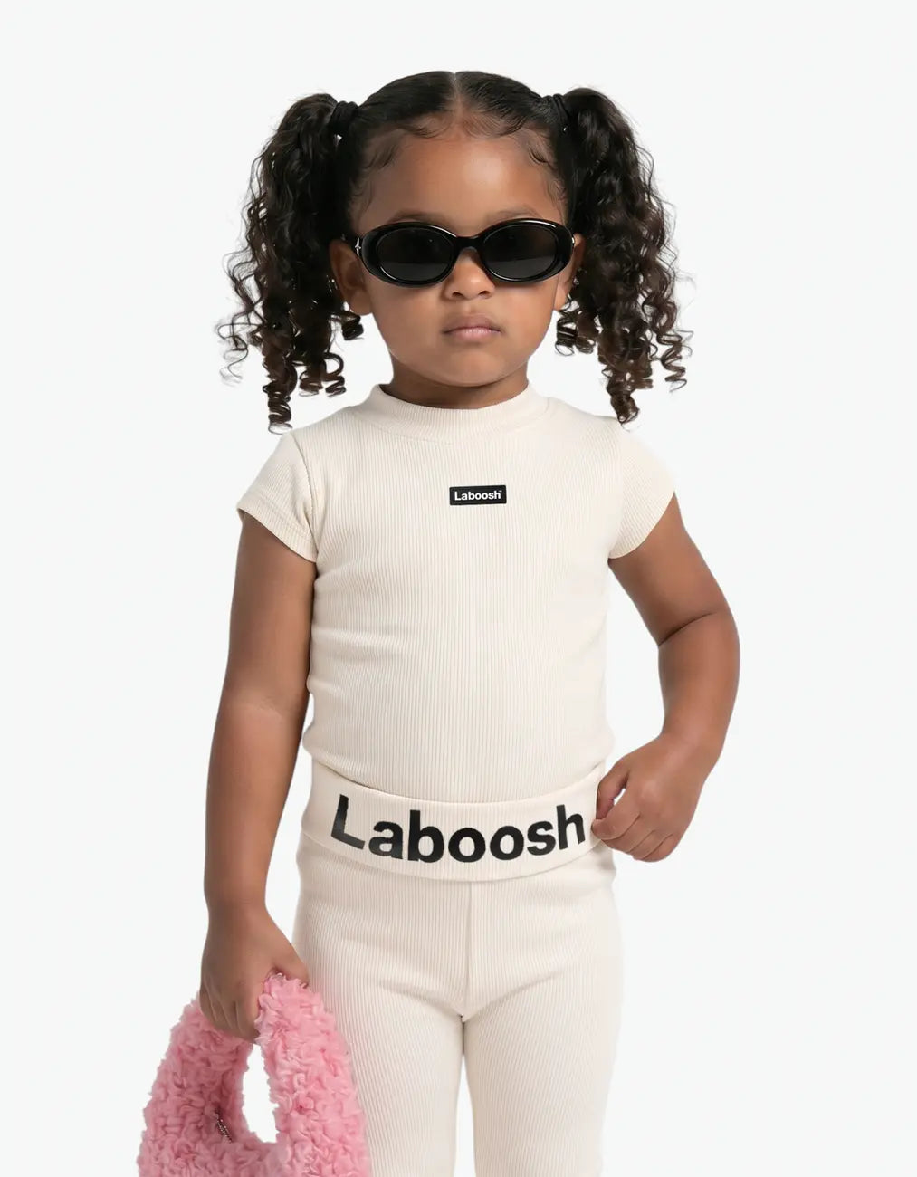 Cream ribbed two-piece set, half-body close-up — Laboosh™ branding on the chest, shown with coordinating MoodSwings staples, easy-care cotton kidswear.