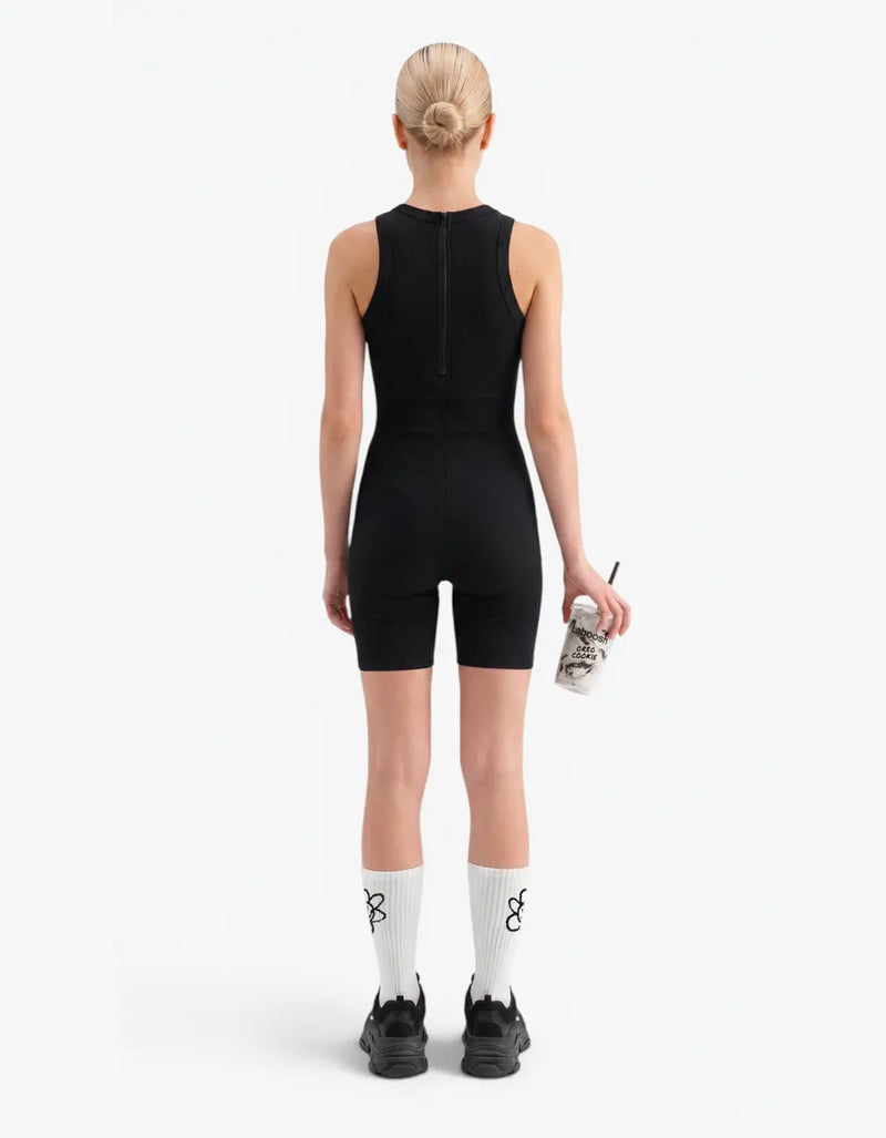 Black ribbed short romper for girls, back view on white background — alt view
