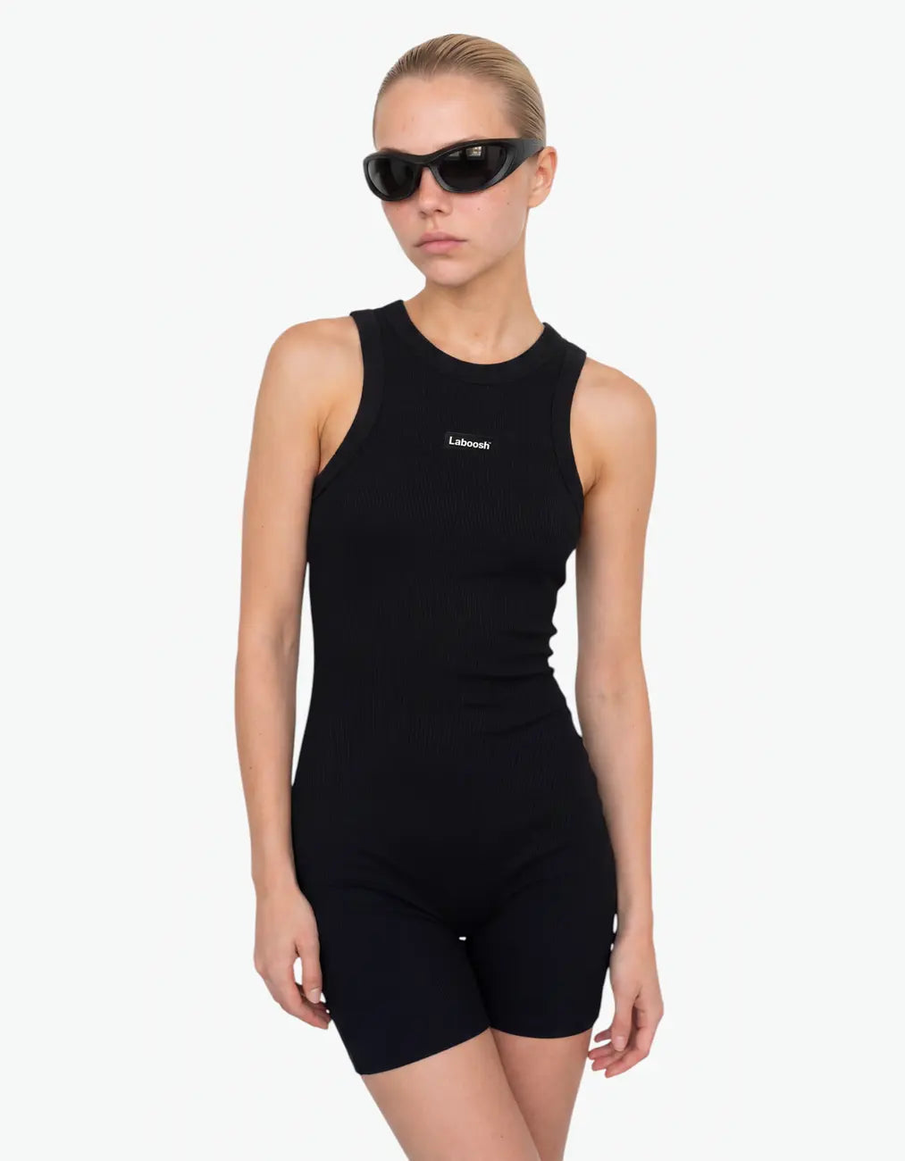Black ribbed short romper for girls with Laboosh logo, half-body close-up on white background