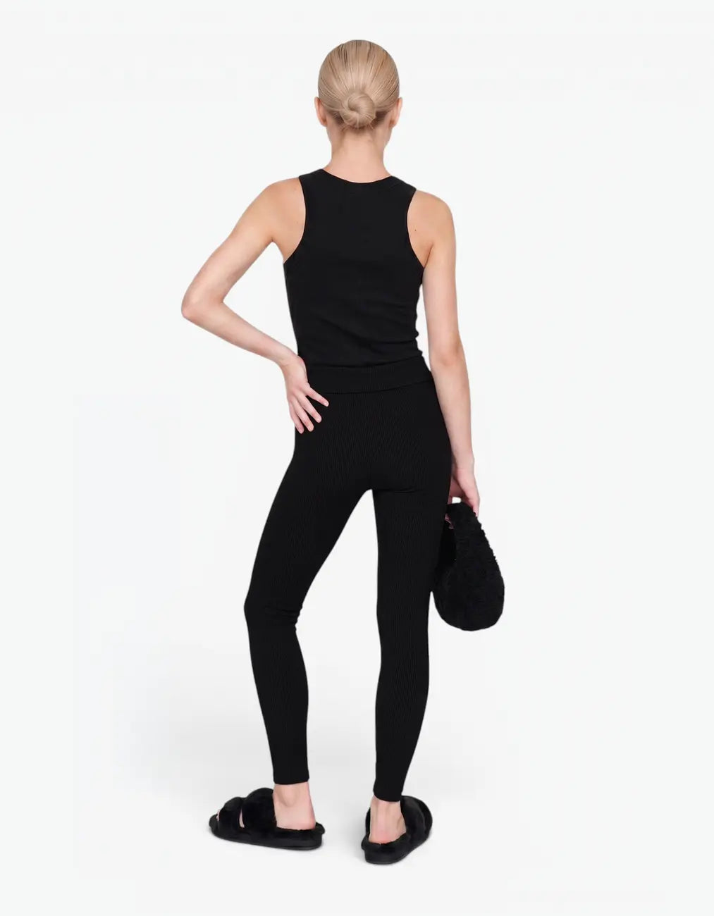 Black ribbed tank top for girls by Laboosh™, back view, sleeveless ribbed-knit tank with matching black ribbed leggings, shown on a white background