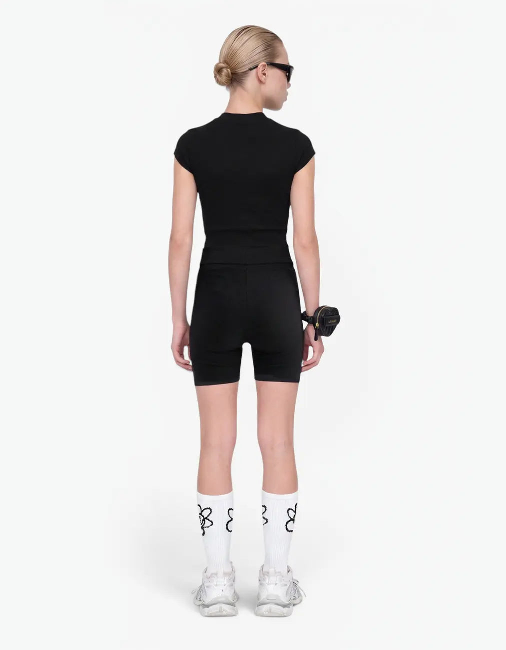 Black ribbed biker leggings for girls, back view on white background