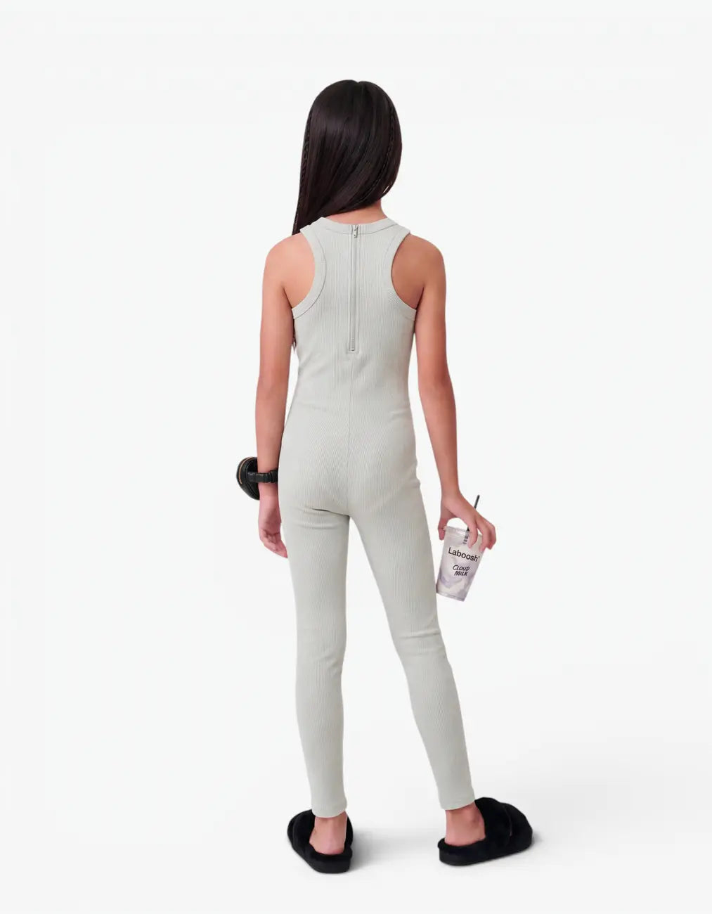 Grey ribbed romper with long pants for girls, back view on white background