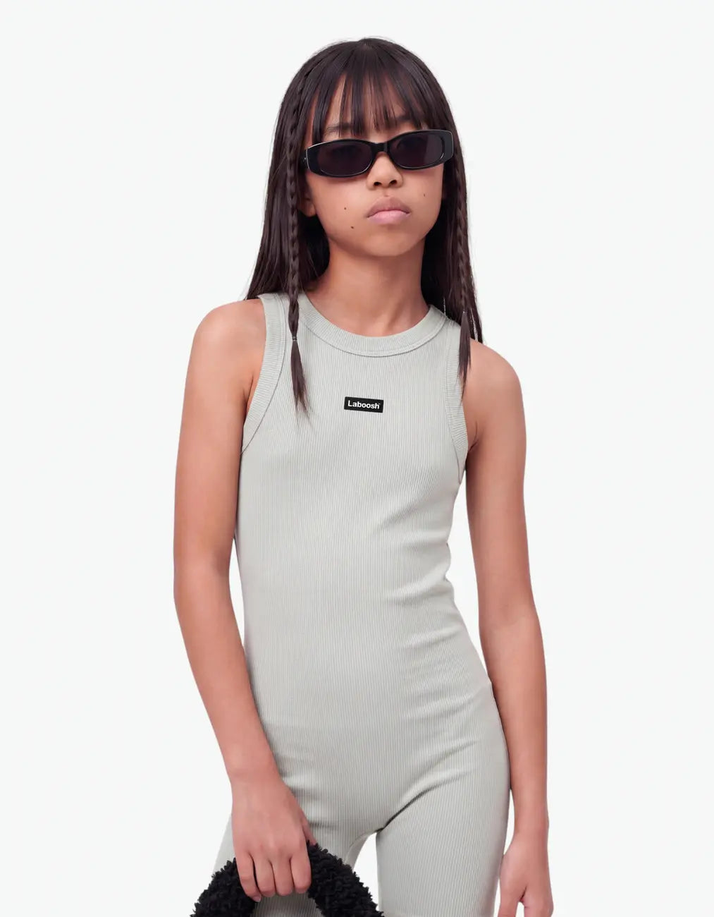 Grey ribbed short romper for girls with Laboosh logo, half-body close-up on white background