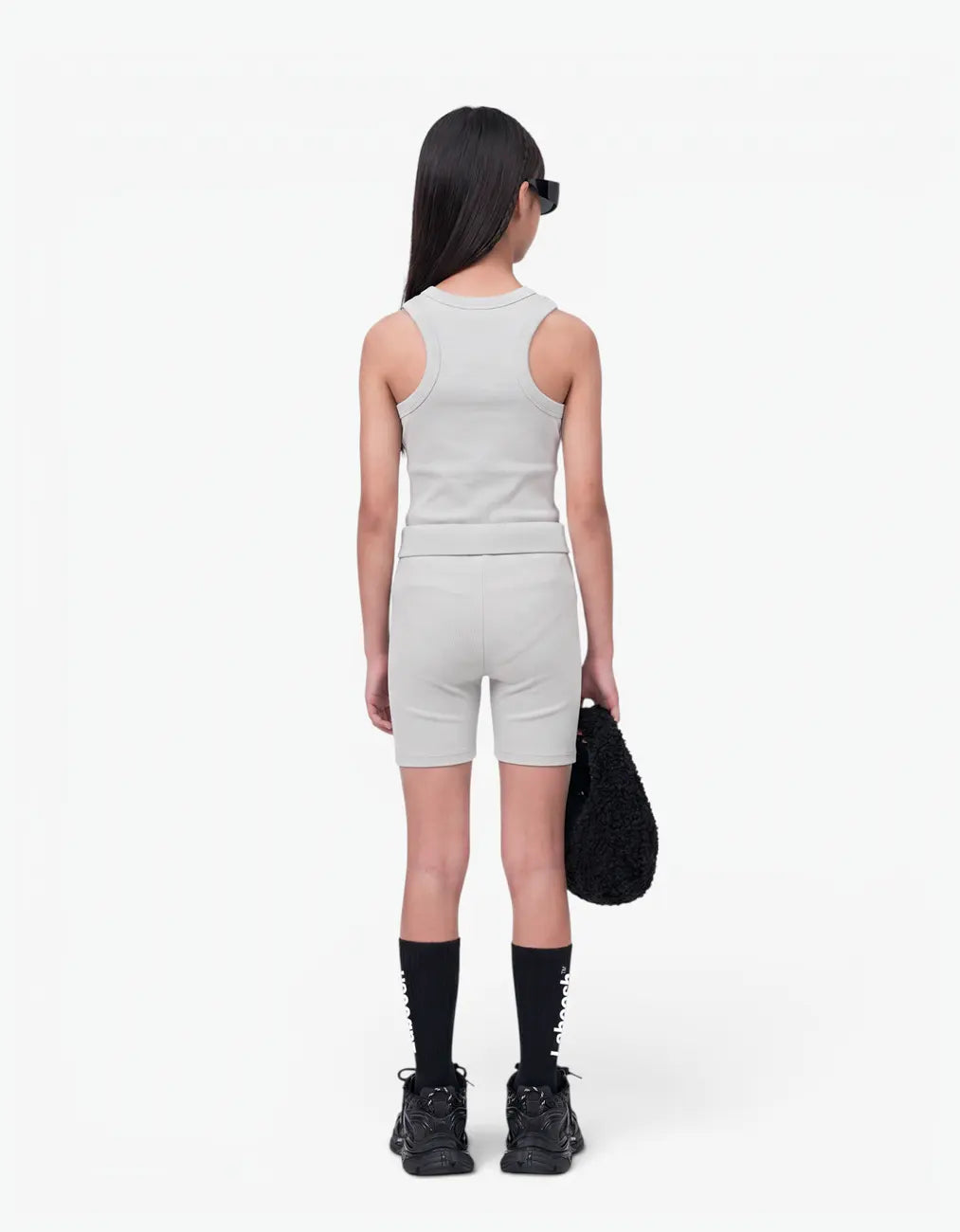 Grey ribbed tank top for girls, back view on white background
