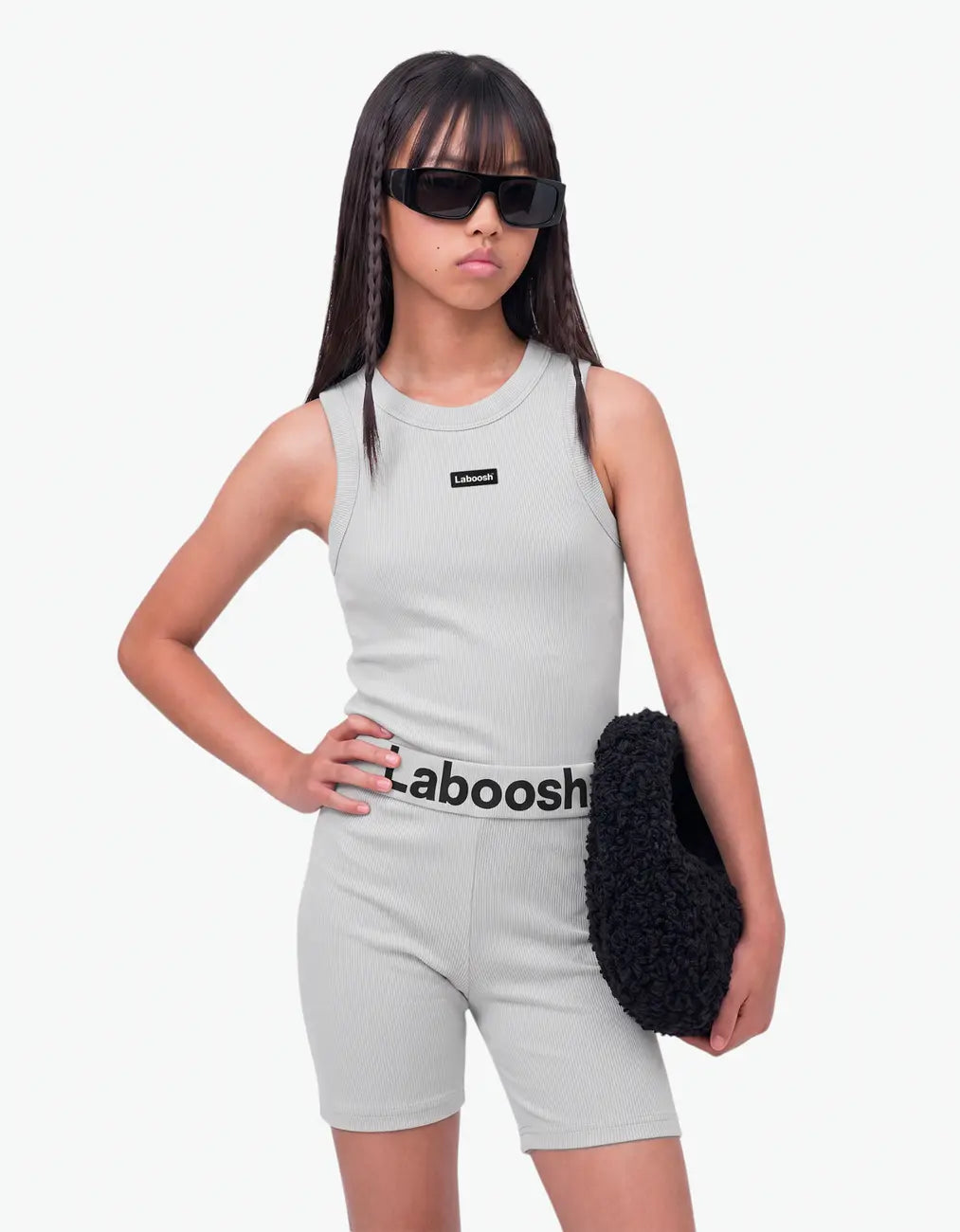 Grey ribbed tank top for girls with Laboosh logo on chest, half-body view on white background