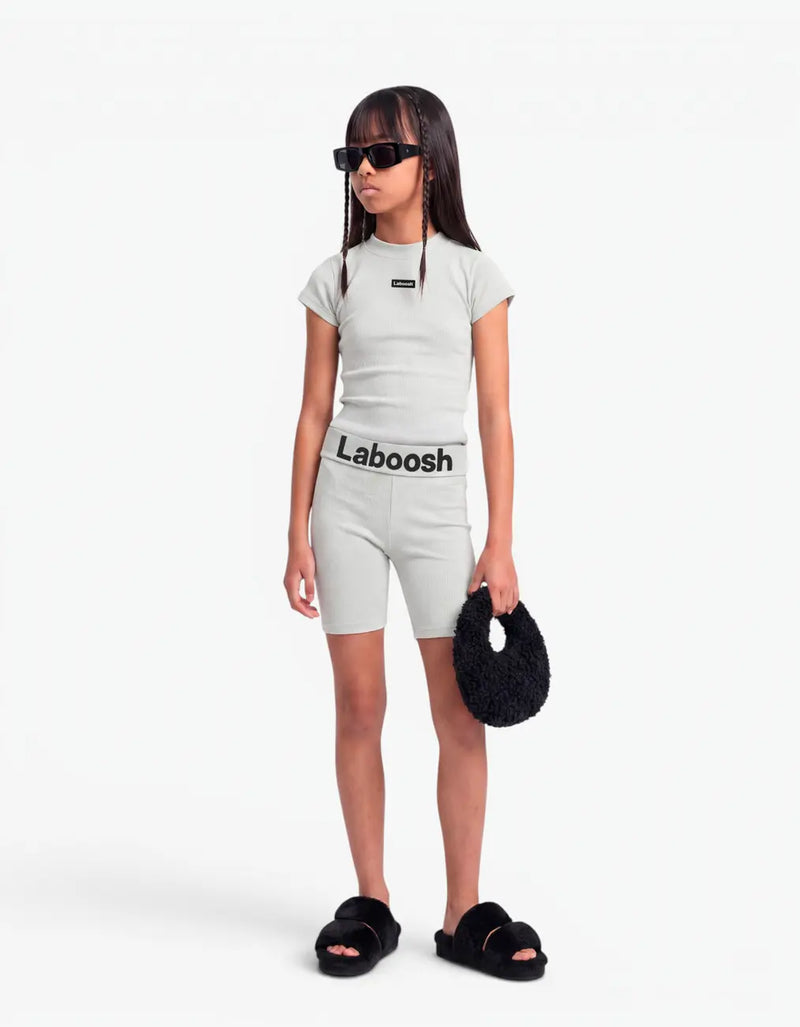 Grey ribbed biker leggings for girls with Laboosh logo waistband, front view on white background