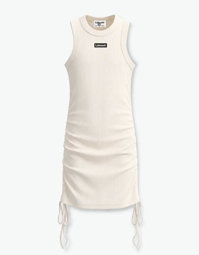 Cream ribbed ruched dress for girls, flat front product shot, sleeveless with drawstring ruched sides and Laboosh™ logo on the chest, on a white background — alt view