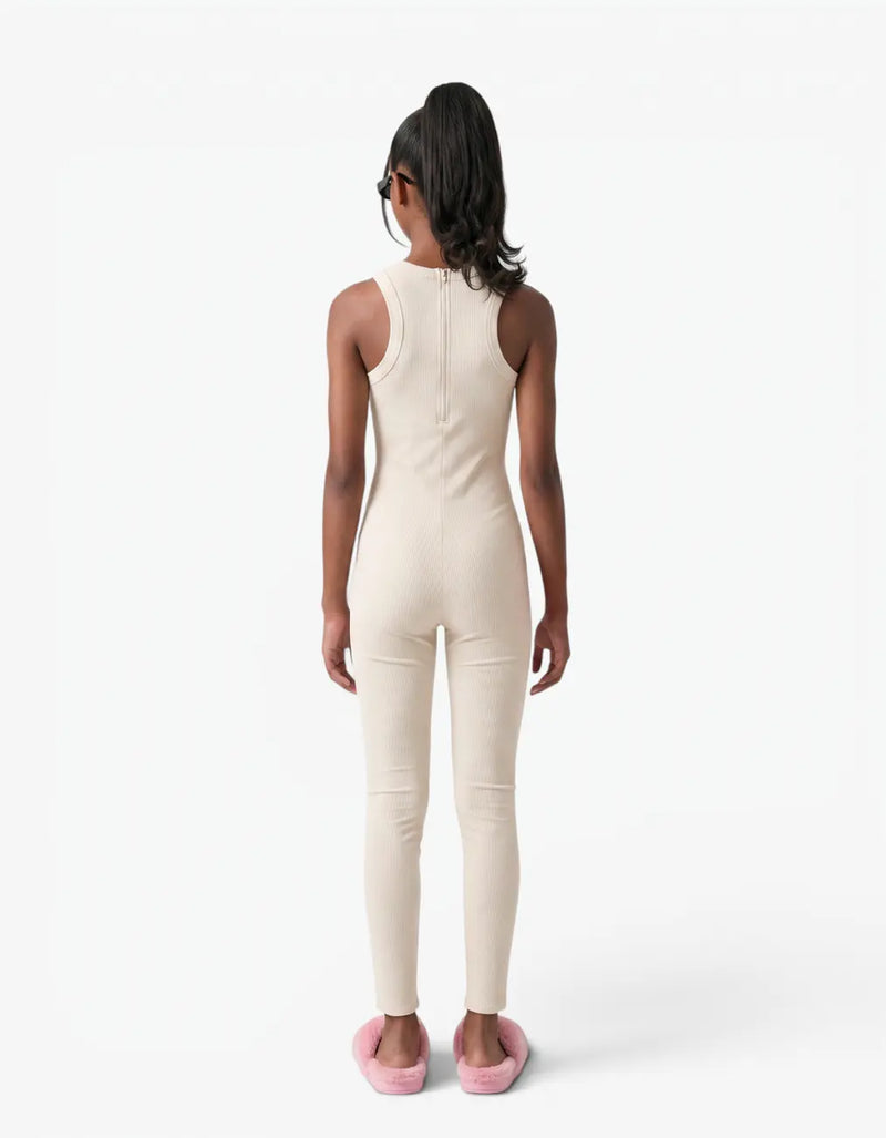 Cream ribbed romper with long pants for girls, back view on white background — alt view
