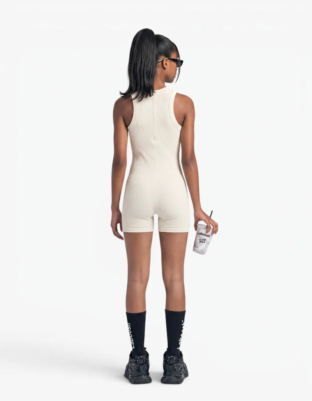 Cream ribbed short romper for girls, back view on white background
