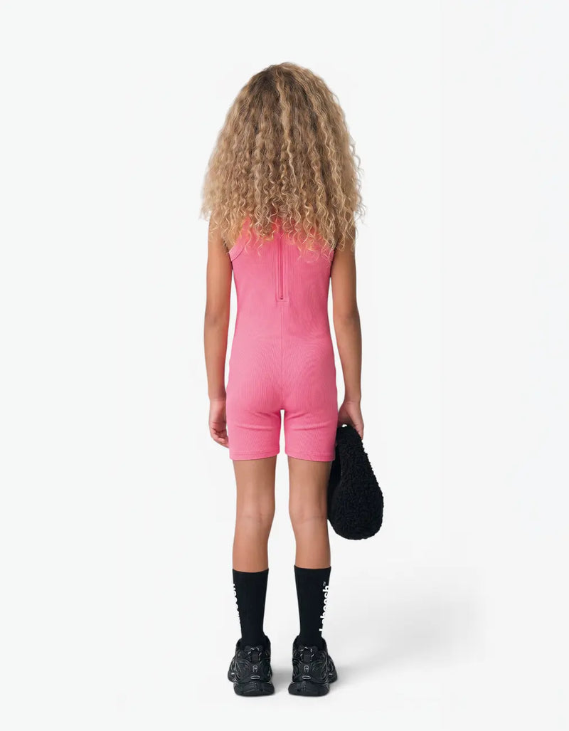 Pink ribbed short romper for girls, back view on white background — alt view